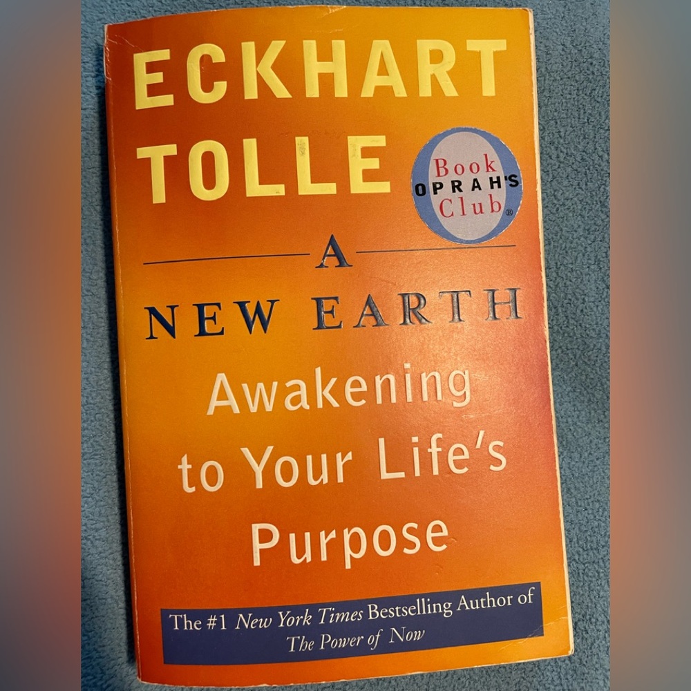 Paperback book “A New Earth” Awakening to Your Life’s Purpose” by Eckhart Tolle